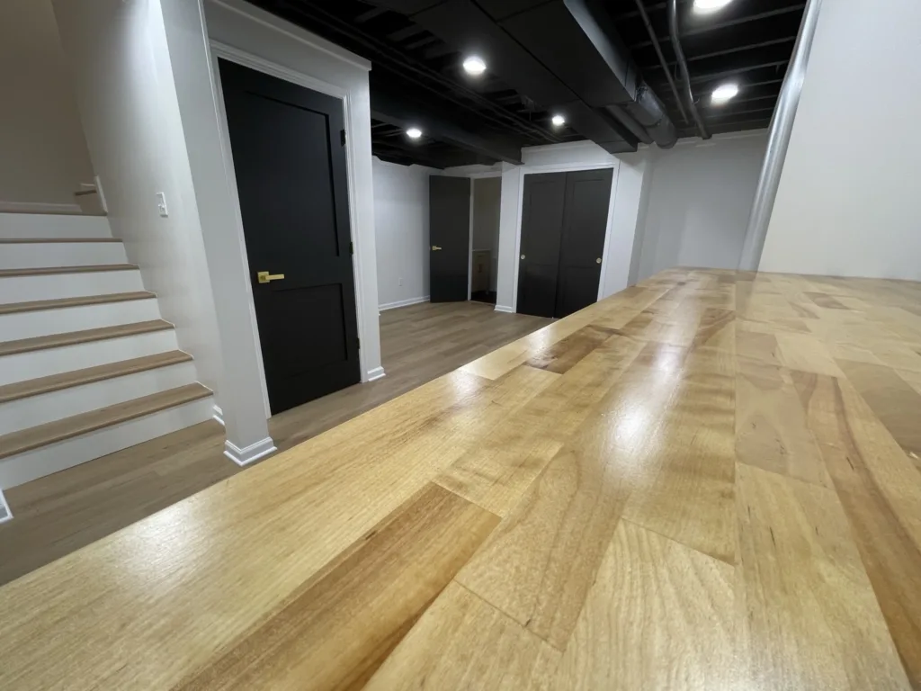 A wooden bar in a basement.